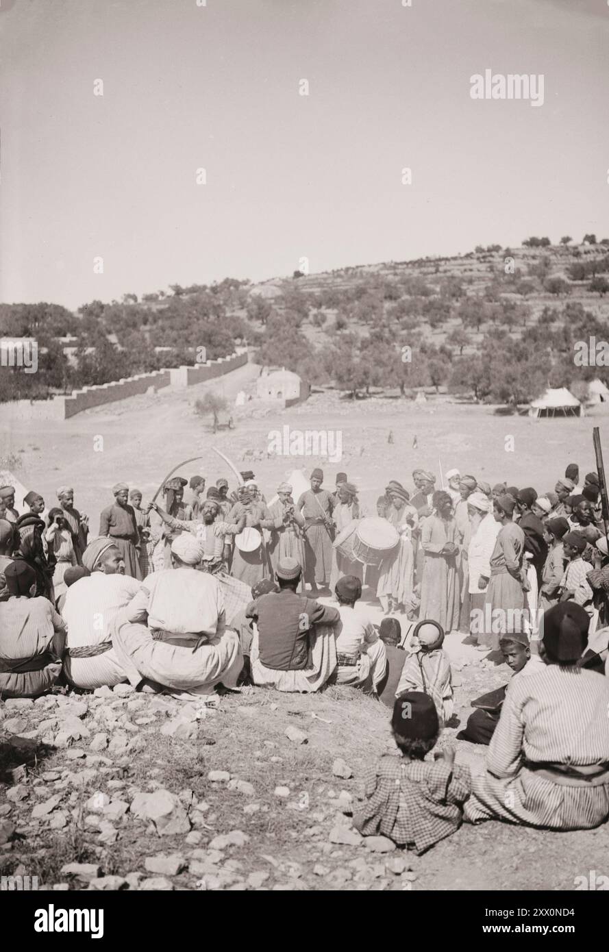 Life in Palestine in the early 20th century. Sword dance at a wedding. Historic Palestine. Ottoman Empire. 1900-1920 Stock Photo