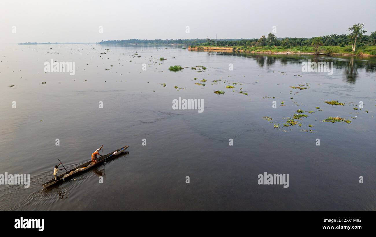 Aerial of a dugout canoe on the Congo River, Mbandaka, Equateur ...