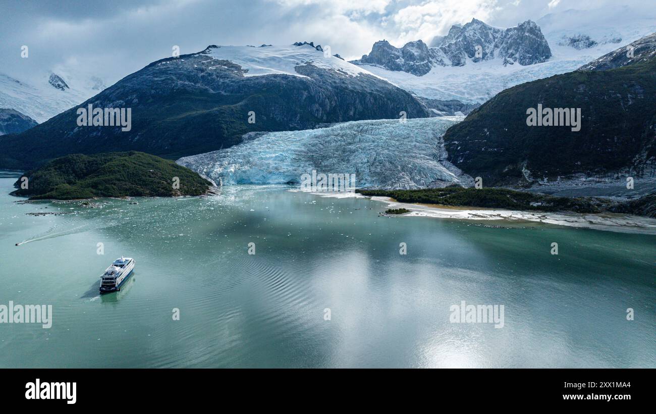 Zodiac below Pia glacier, Tierra del Fuego, Chile, South America Stock Photo