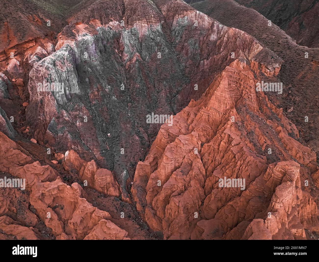 Kok-Moinok Canyon, a clay-sand structure formed on the slopes of arid mountains cut by water streams, Kyrgyzstan, Central Asia, Asia Stock Photo