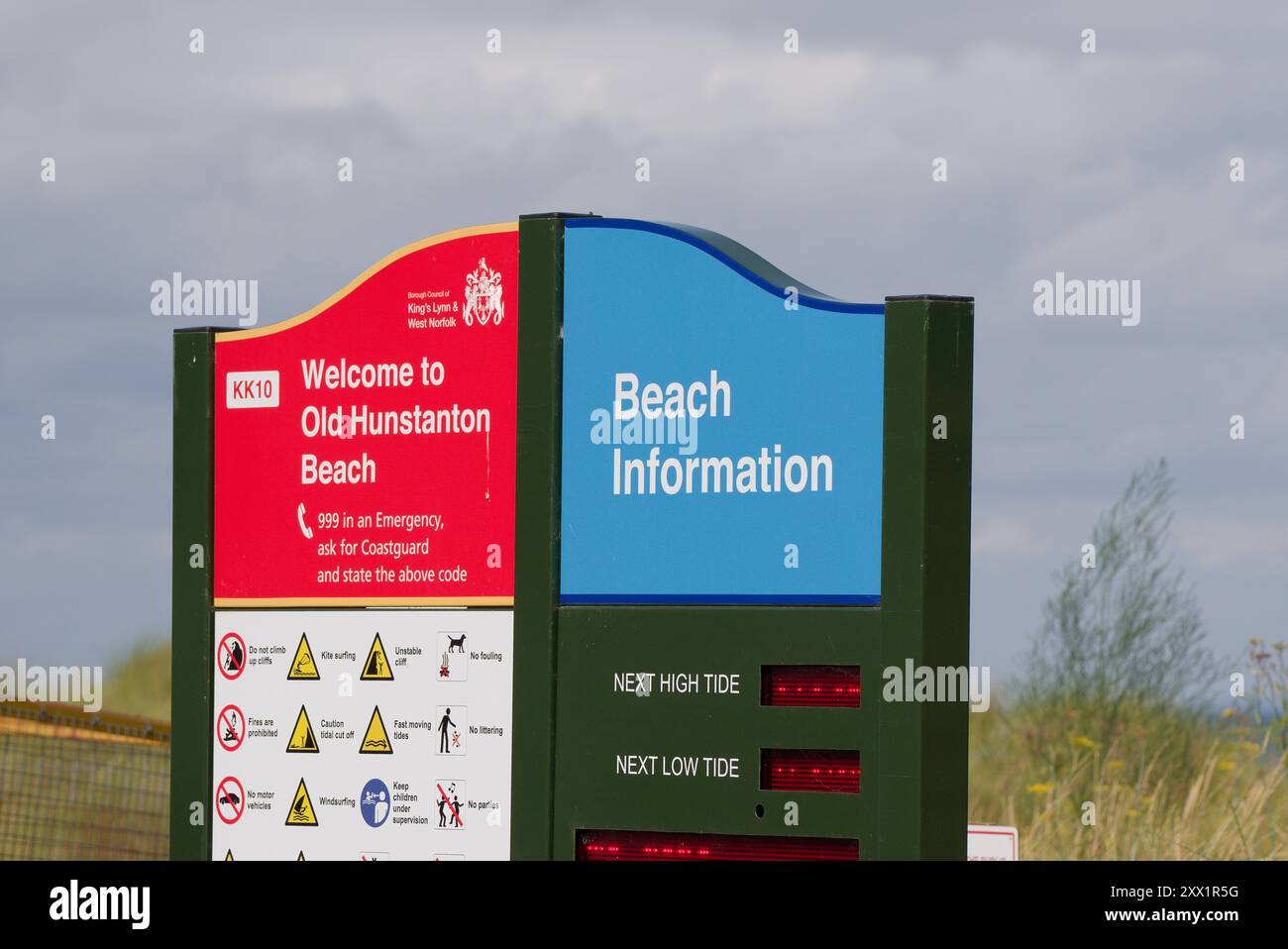 Tide times information board at Old Hunstanton beach, Norfolk, UK Stock Photo