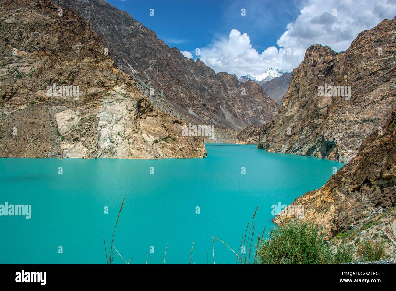 Beautiful blue lake along the karakoram highway in the mountains Stock Photo