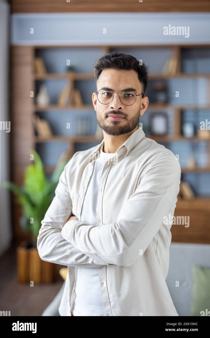 Indian man standing confidently hi-res stock photography and images - Alamy
