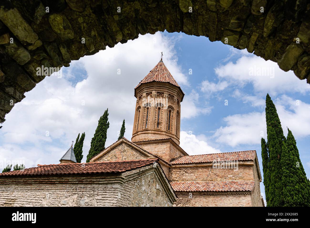 Akhmeta Tower of the Academy of Ikalto viewed through an arch, Kakheti region ...