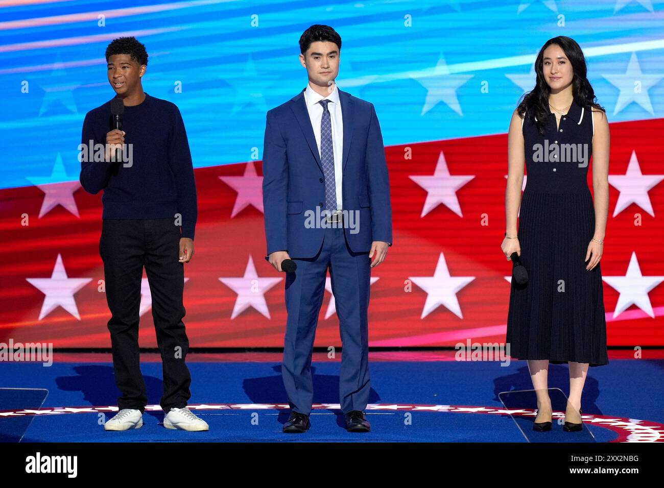 Alexander Hudlin, from left, Jasper Emhoff and Arden Emhoff speak