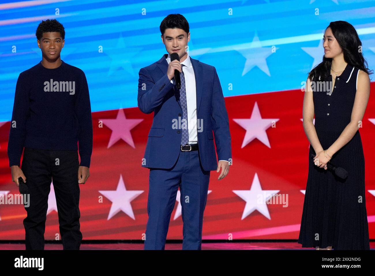 Alexander Hudlin, from left, Jasper Emhoff and Arden Emhoff speak