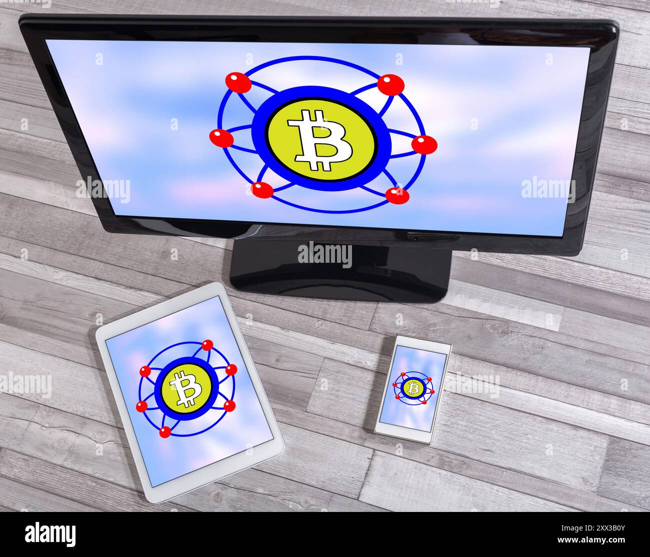 Bitcoin concept shown on different information technology devices Stock Photo