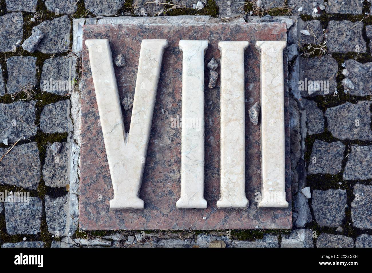 Building materials, memorials, white inscriptions in gray, brown 