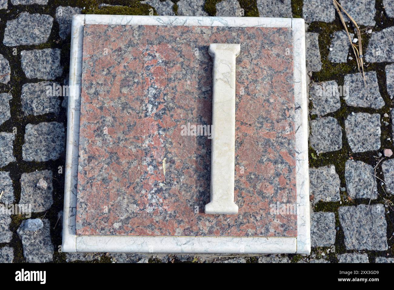 Building materials, memorials, white inscriptions in gray, brown 