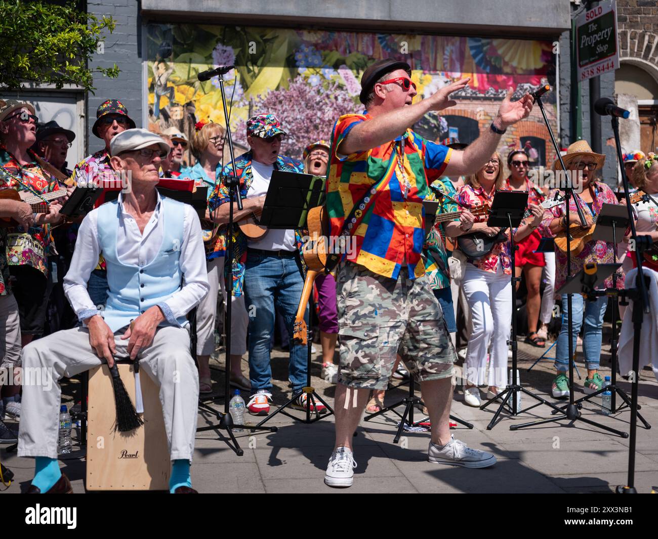 People enjoying a band performing at the Stoneybatter Festival in Dublin city, Ireland. Stock Photo