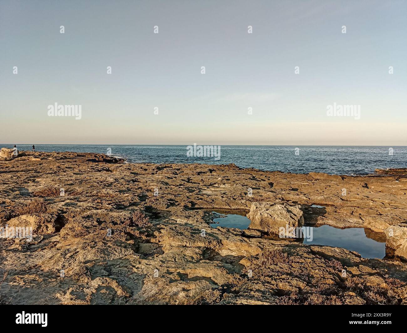 Sunset scene over rocky coastline hi-res stock photography and images ...