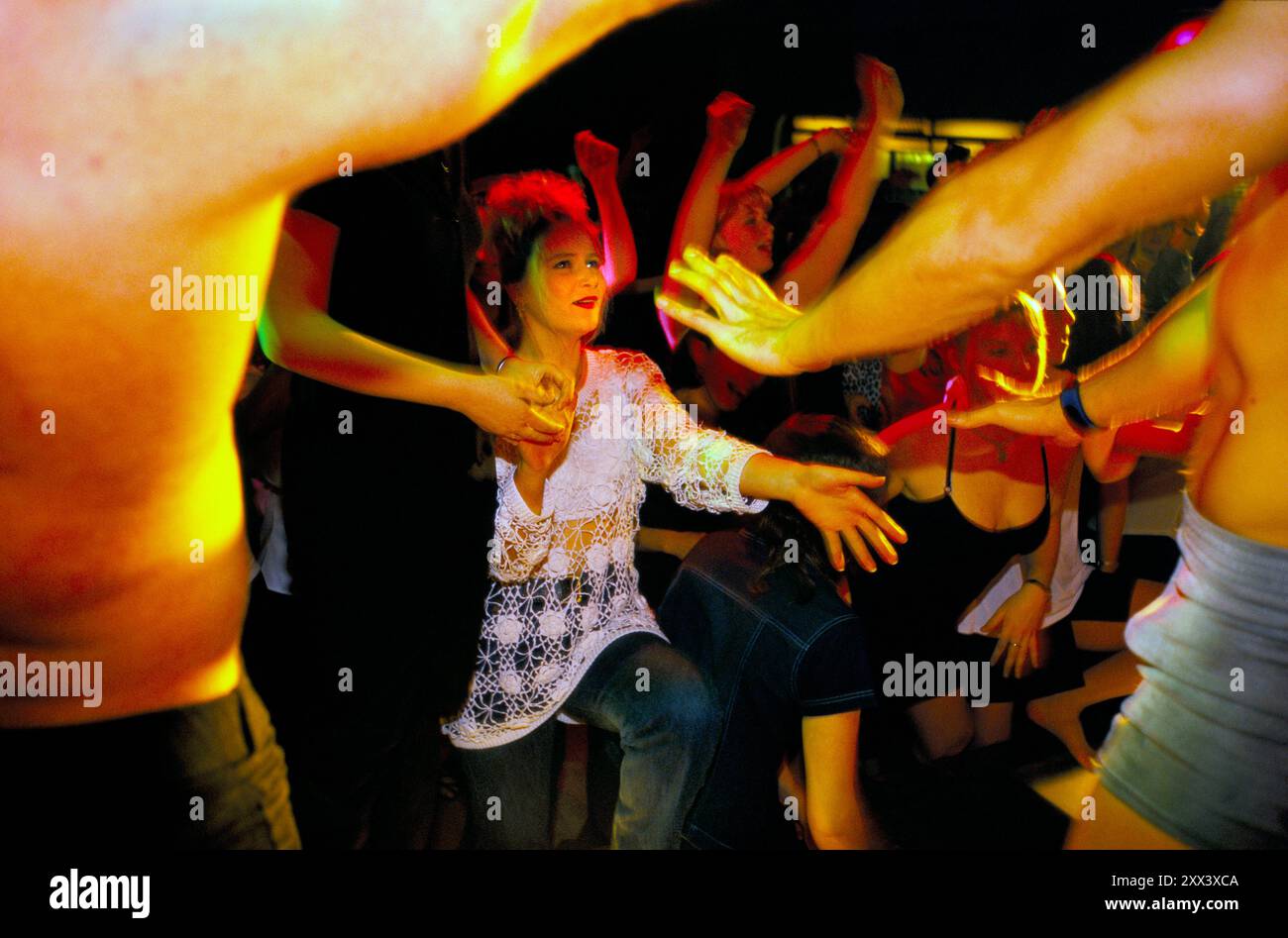 young-women-disco-dancing-with-male-strippers-at-the-end-of-a-hen-party