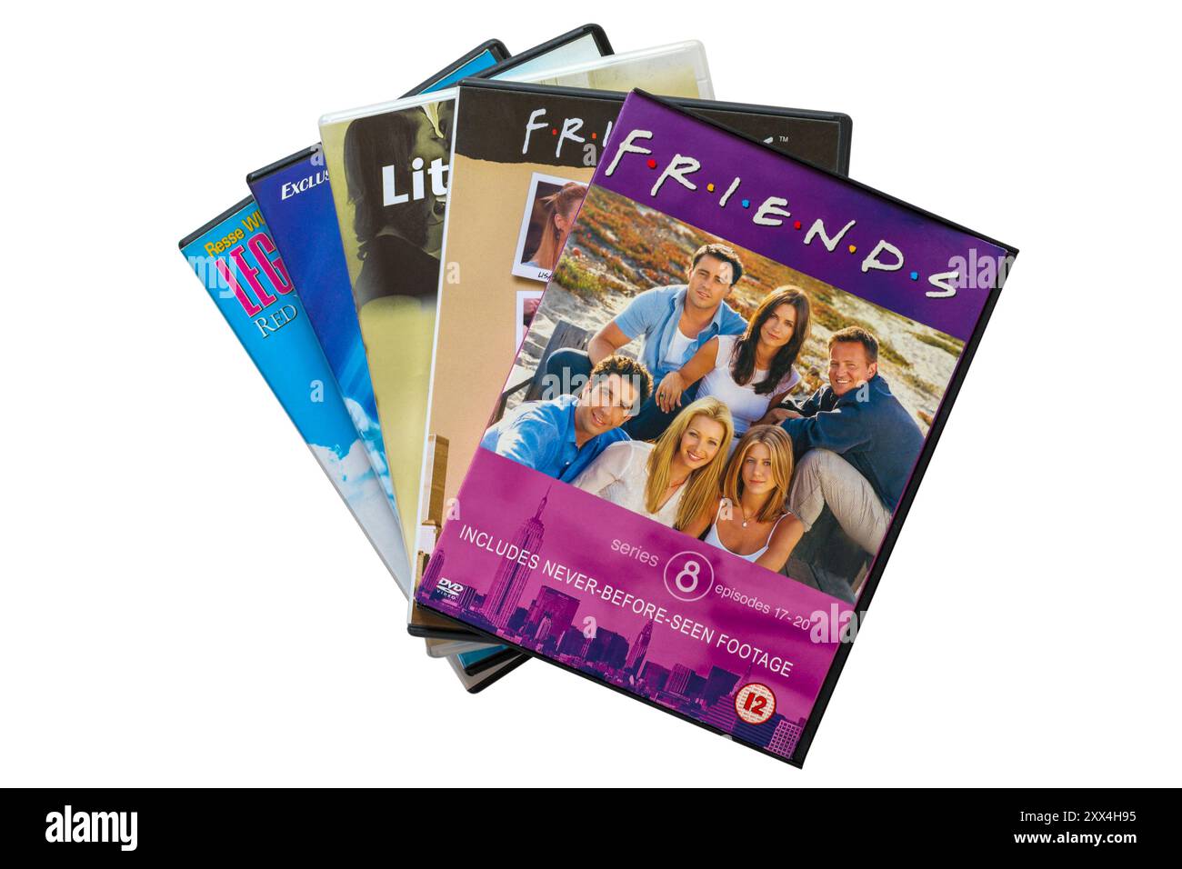 pile of DVDs with Friends series 8 episodes 17-20 DVD on top isolated ...