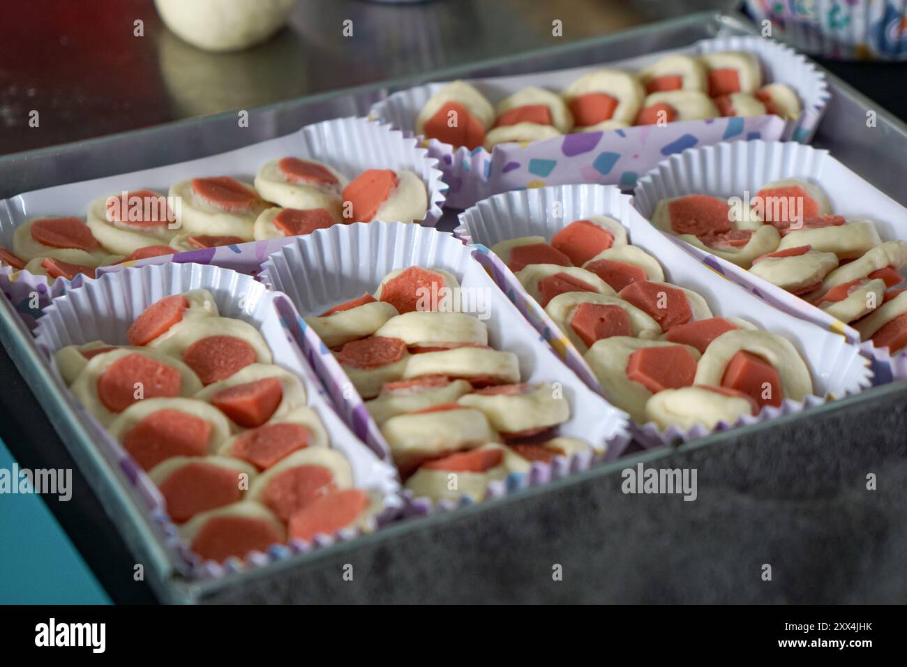 Sausage bun placed in a long paper baking cup Stock Photo - Alamy
