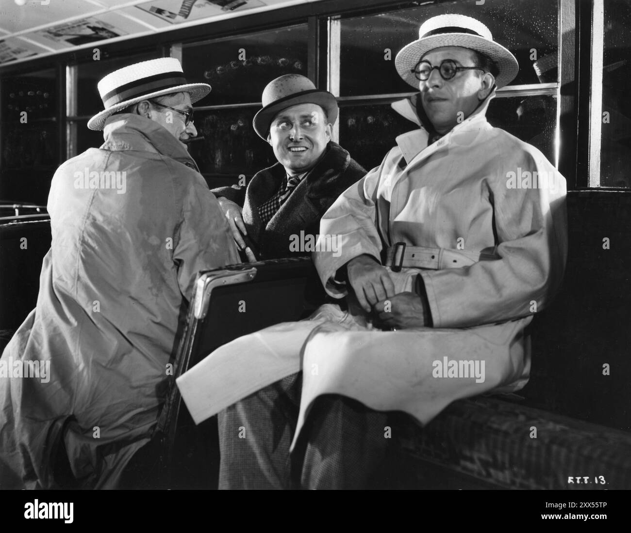 PERCY PARSONS, Brighton-born English comedian MAX MILLER and HARTLEY POWER in a scene from FRIDAY THE THIRTEENTH 1933 Director VICTOR SAVILLE Story SIDNEY GILLIAT Gainsborough Pictures Stock Photo