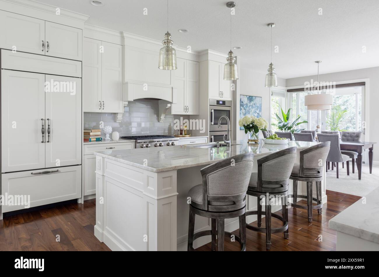 Kitchen View Into White kitchen with view into dining area Stock Photo - Alamy