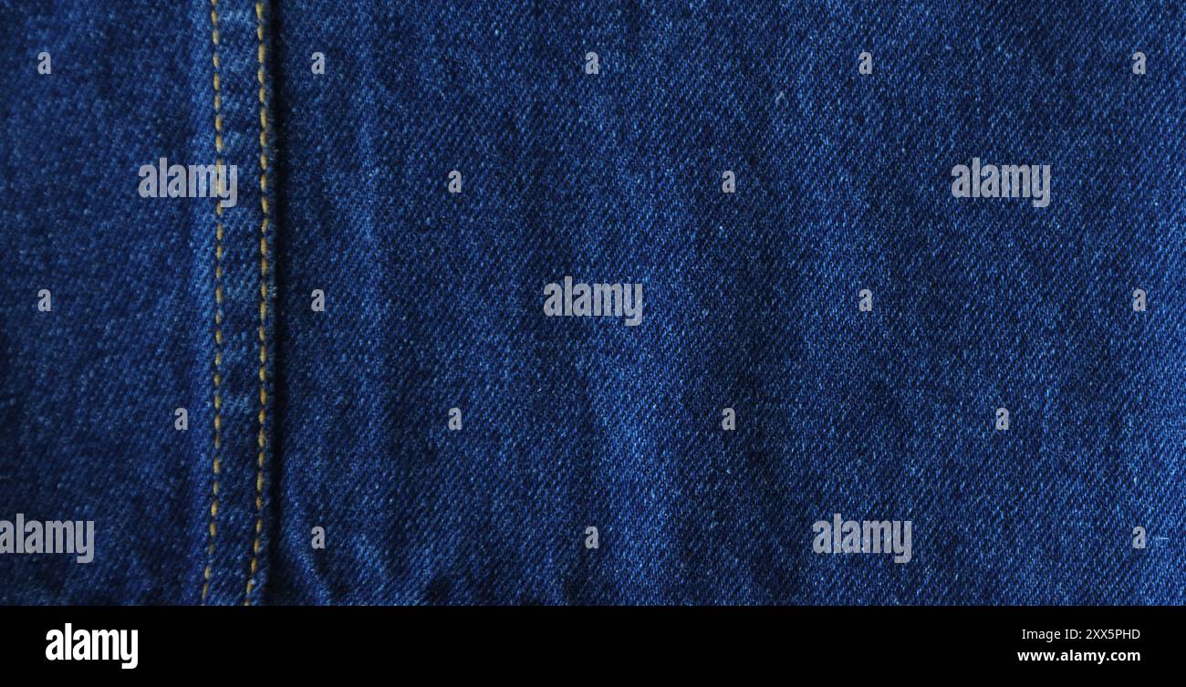 Close-up of blue denim jeans fabric texture background Stock Photo - Alamy