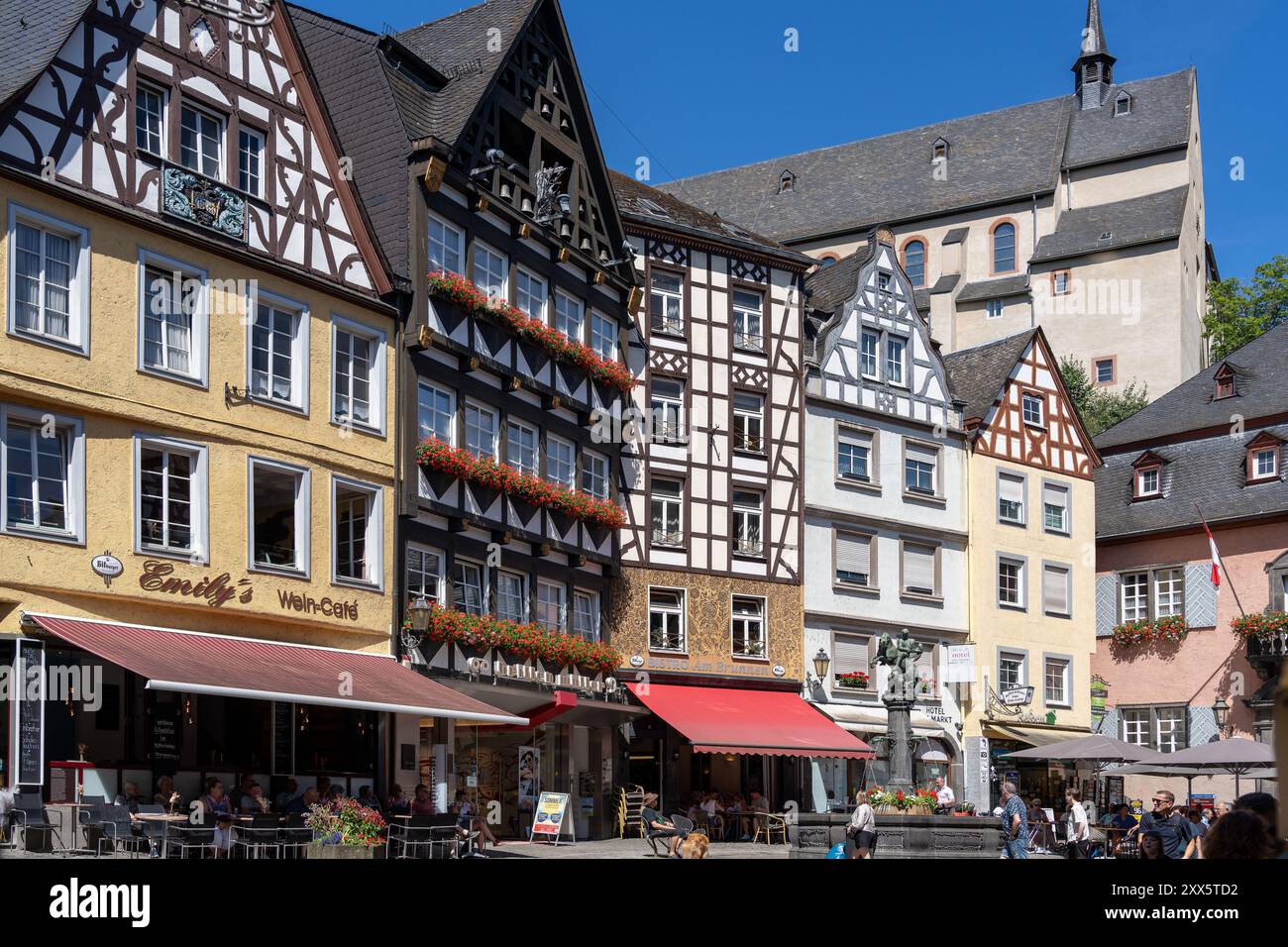 Cochem, Germany July 09 2024 Colorful halftimbered houses iand cafes n the historical