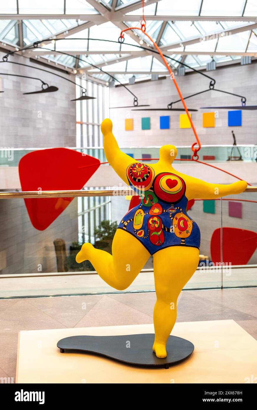 sculpture by Niki de Saint Phalle called Yellow Nana in the lobby