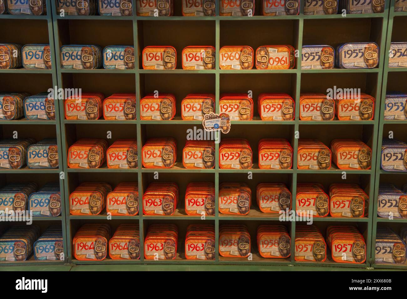 Shelves filled with a variety of colourful and artistically designed sardine tins that have a nostalgic charm, canned sardines, Obidos, Obidos, Oeste Stock Photo