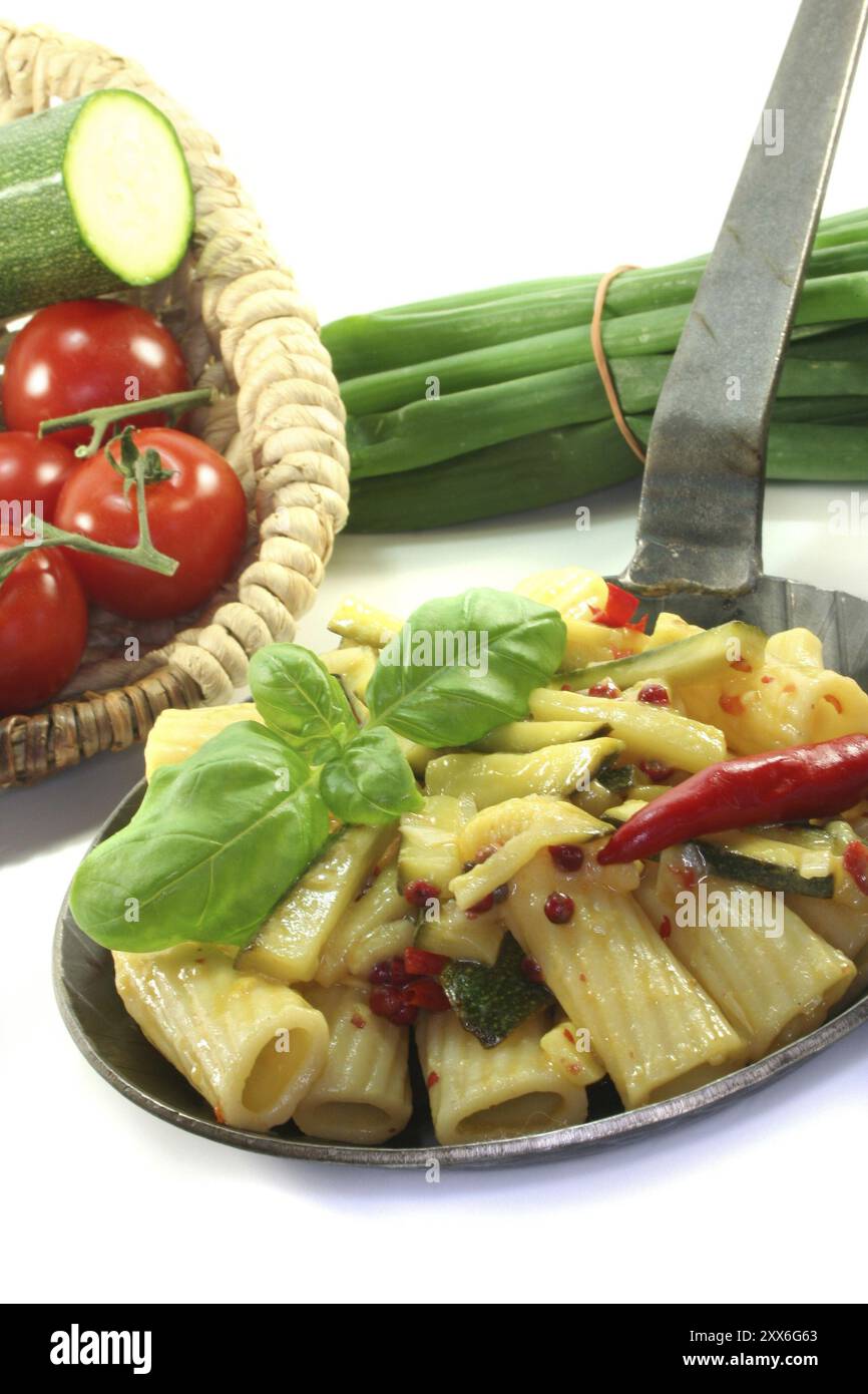 Tortiglione with fiery chilli, garlic, courgette and herbs Stock Photo