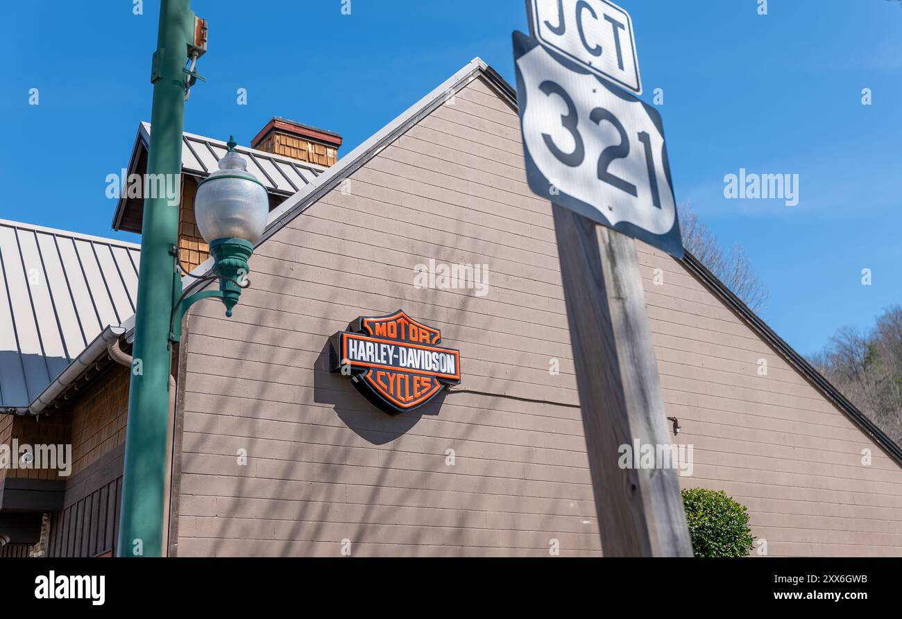 GATLINBURG, TN - 12 MAR 2024: Street view of Harley Davidson sign on the wall of the Hillbilly Harley store on a sunny day in Tennessee. Stock Photo