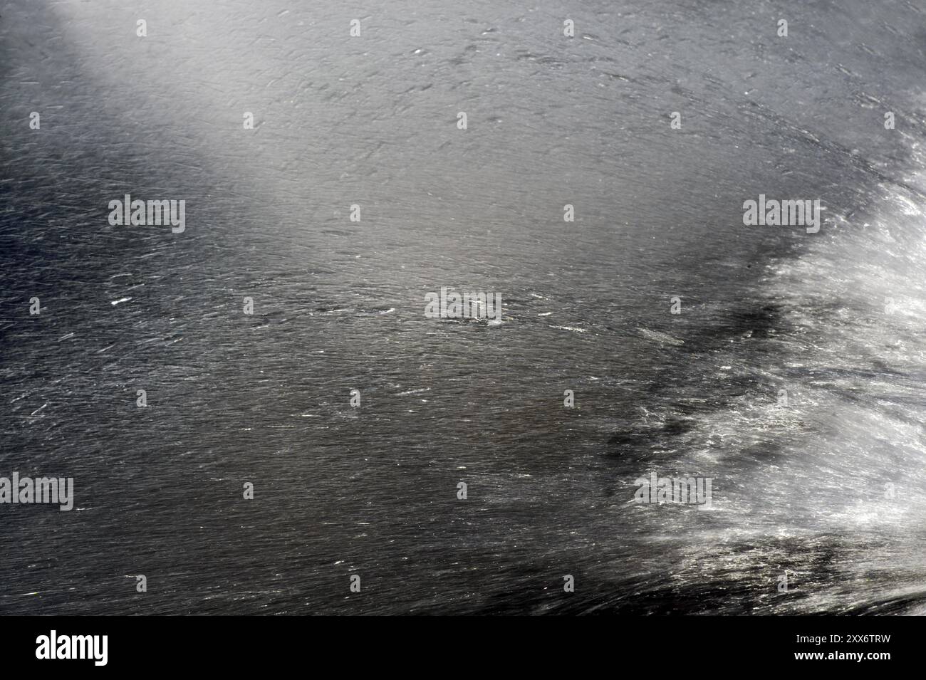 Close-up of a jet of water in sunlight Stock Photo