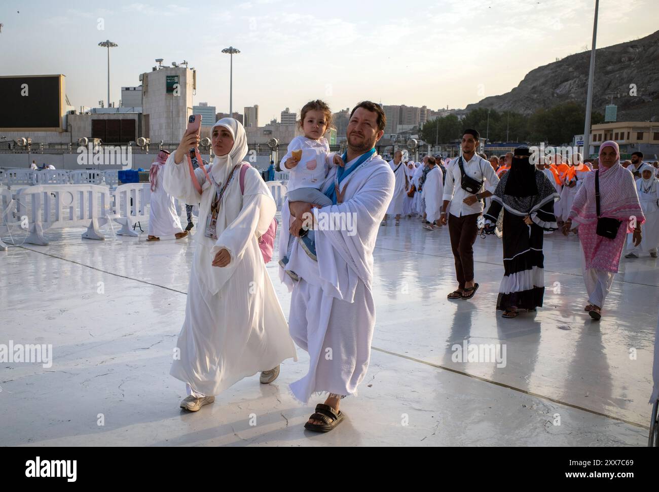 Mecca, Saudi Arabia - June 8, 2024: A happy family with their child ...