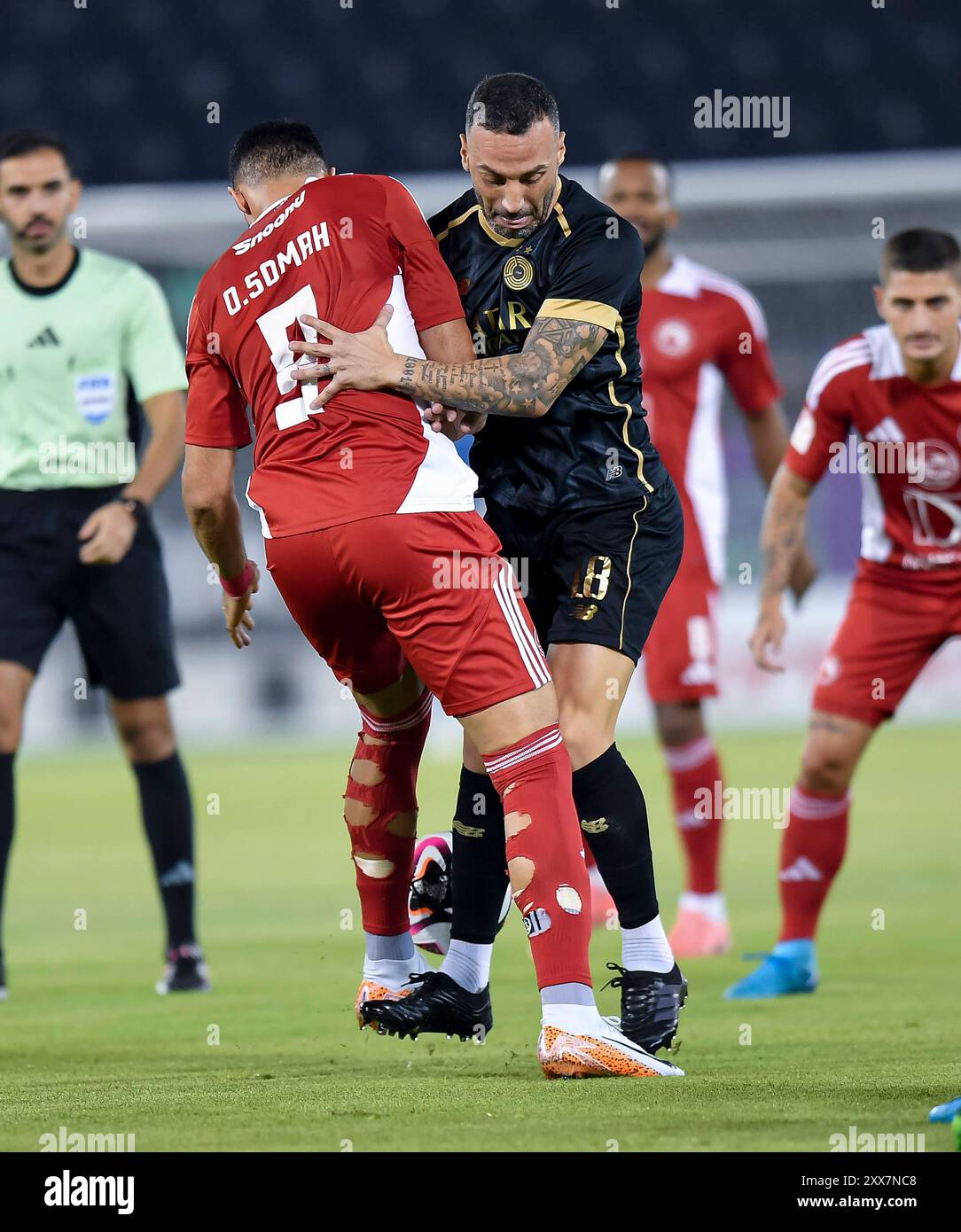 AL SADD SC vs AL ARABI SC -OOREDOO STARS LEAGUE QATAR Guilherme Torres R of Al-Sadd SC and Omar Jehad Alsoma L of Al-Arabi SC in action during the Ooredoo Stars League 24/25 match between Al-Sadd SC and Al-Arabi SC at Jassim Bin Hamad Stadium in Doha, Qatar, on August 22, 2024. DOHA Qatar Copyright: xNOUSHADx Stock Photo