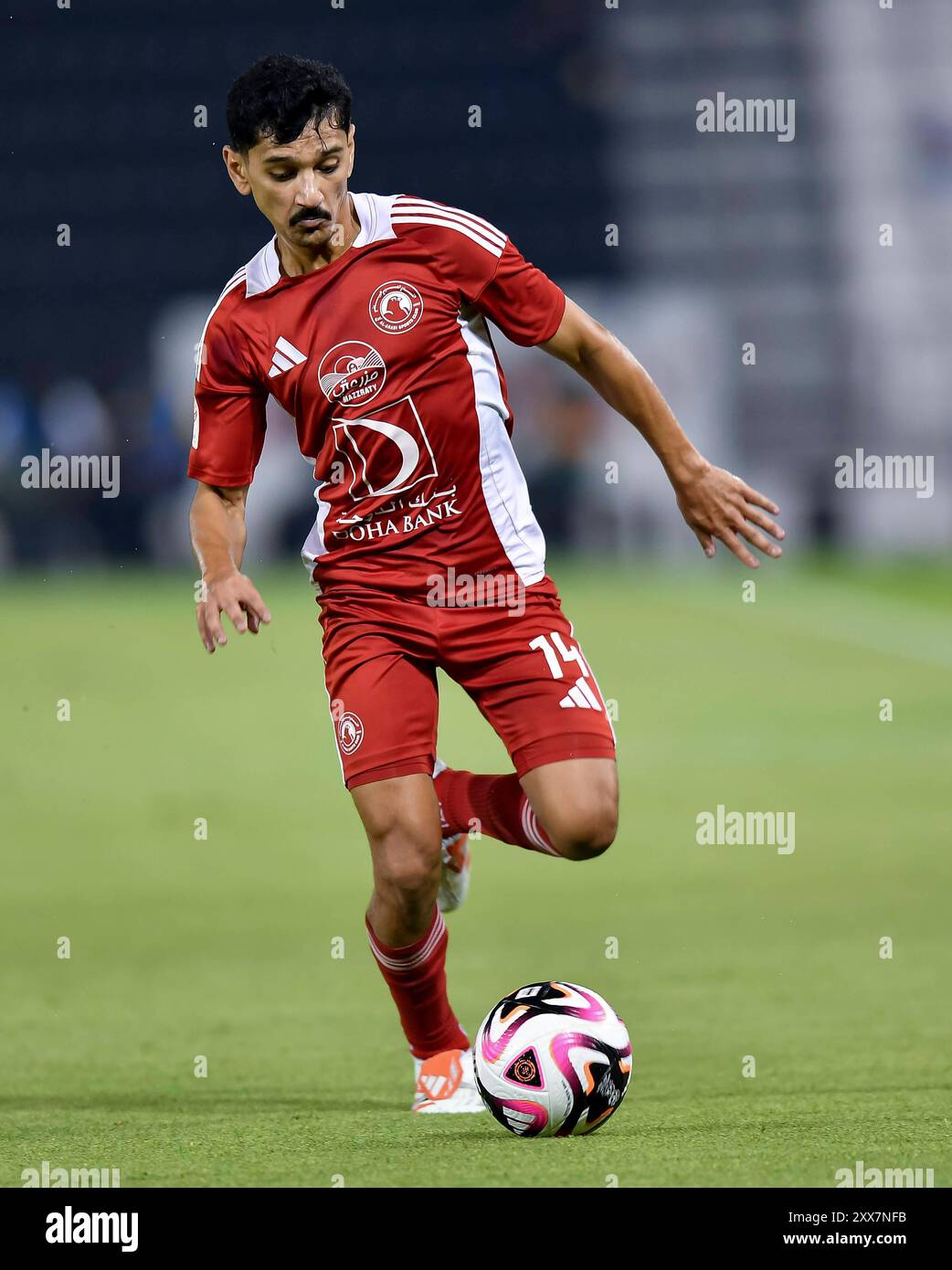 AL SADD SC vs AL ARABI SC -OOREDOO STARS LEAGUE QATAR Helal Mohamed AlSaeed of Al-Arabi SC in action during the Ooredoo Stars League 24/25 match between Al-Sadd SC and Al-Arabi SC at Jassim Bin Hamad Stadium in Doha, Qatar, on August 22, 2024. DOHA Qatar Copyright: xNOUSHADx Stock Photo