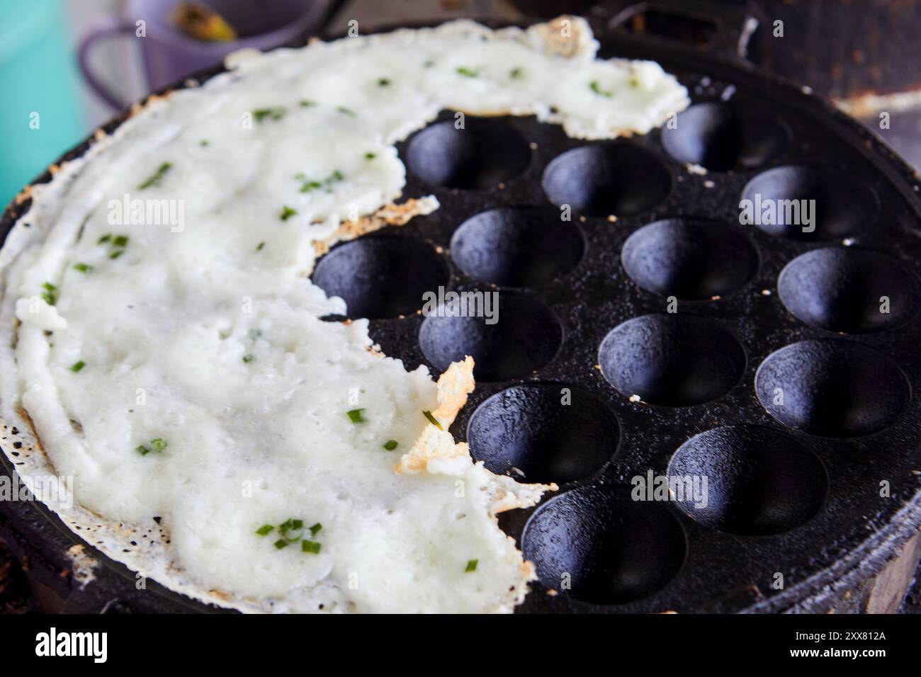 Coconut-rice cakes Thai dessert in hot pan Stock Photo