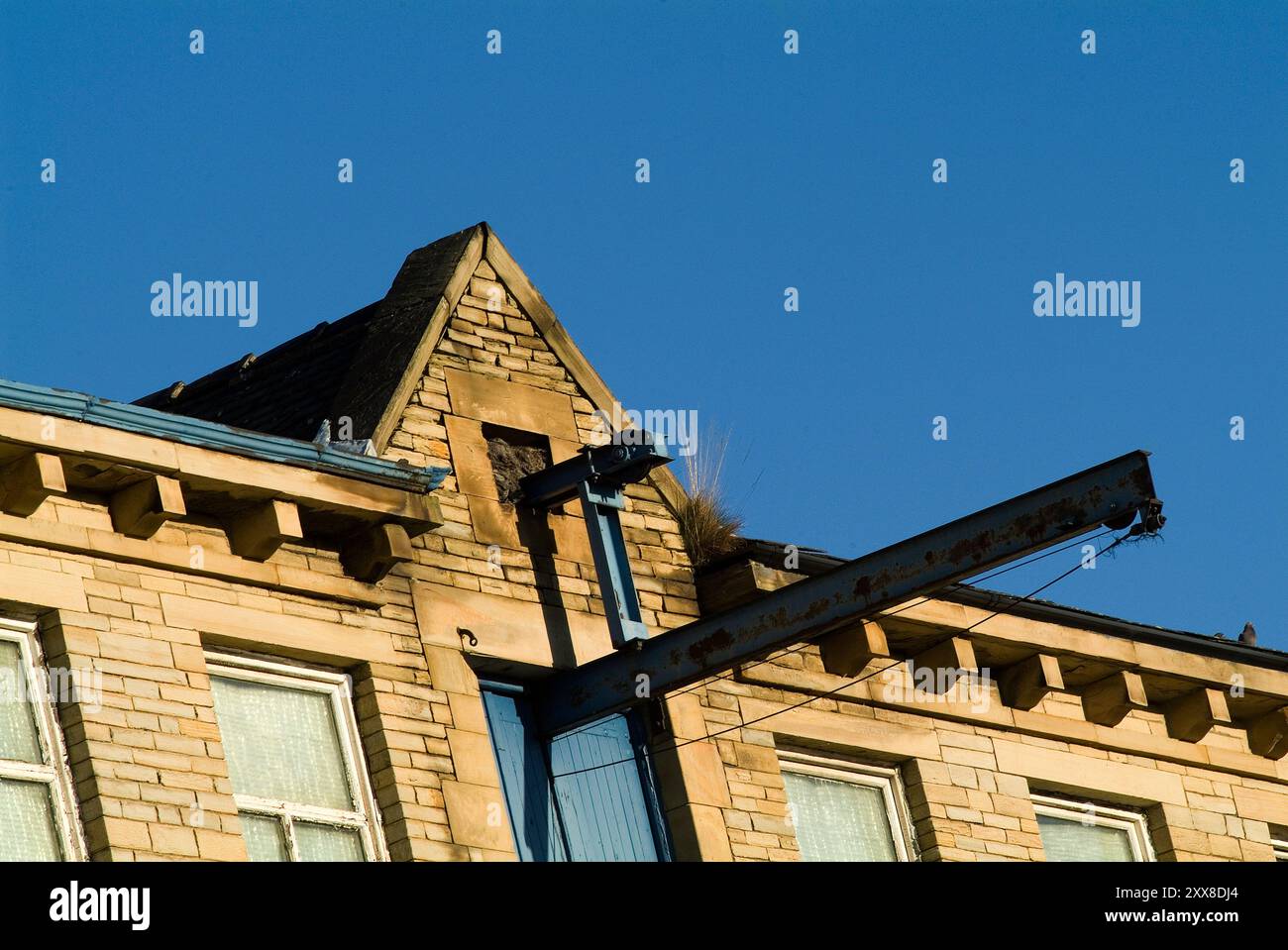 Old mill buildings, part of historic architecture in the City of Bradford, west Yorkshire, northern England, UK Stock Photo