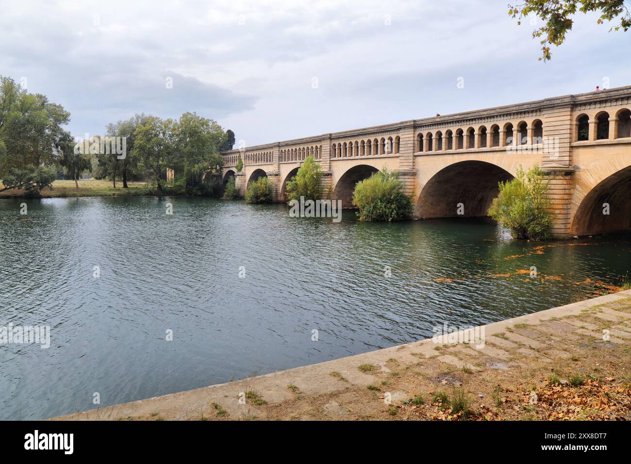 Canal du Midi bridge crossing river Orb in Beziers, France. Stock Photo