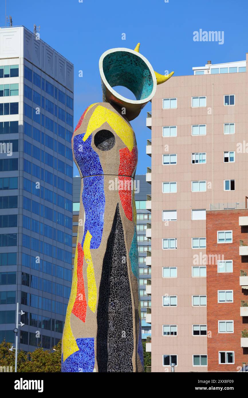 BARCELONA, SPAIN - OCTOBER 8, 2021: Public park view: Parc de Joan Miro in Barcelona. The park features famous public space sculpture Dona i Ocell by Stock Photo