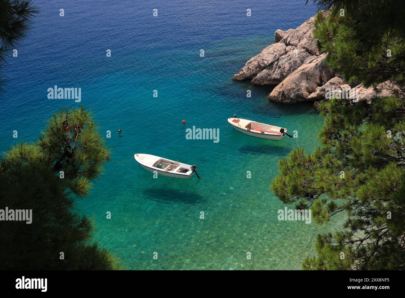 Brela, Croatia. Adriatic Sea nature. Podrace beach levitating boats. Croatia summer vibes. Stock Photo