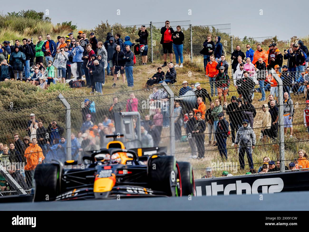 ZANDVOORT - 23/08/2024, Fans watch Max Verstappen (Red Bull Racing