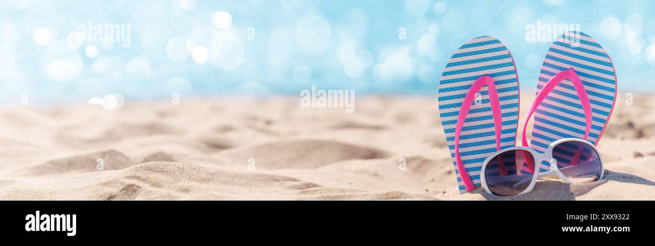 Flip flops and shades on the sea beach, summer vacation with copy space ...