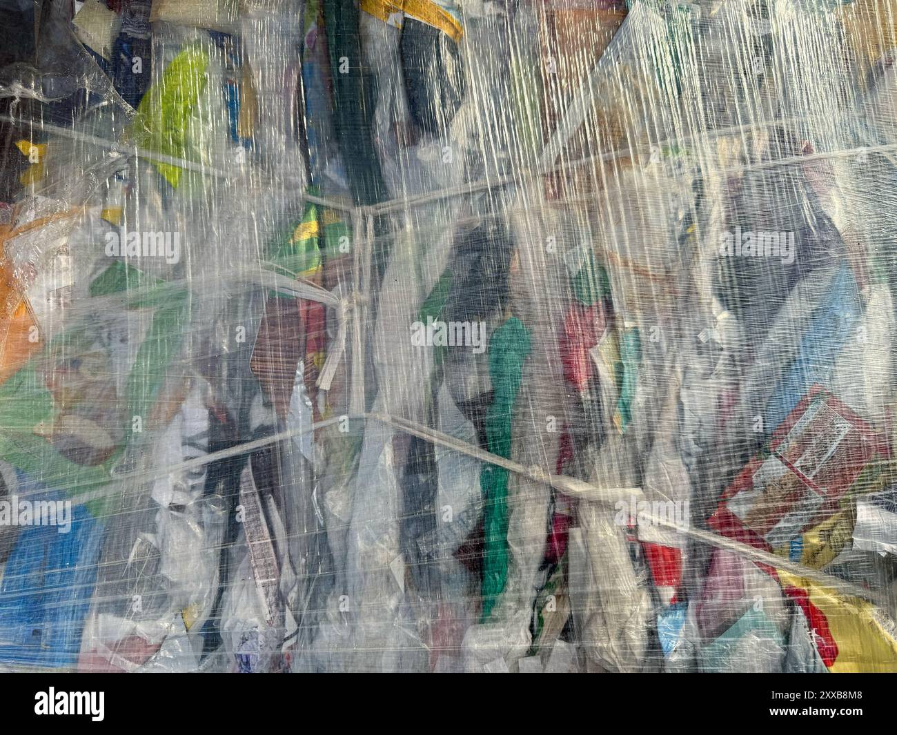 Plastic bottles,compressed into bales and ready for recycling. Zero waste concept. Stock Photo