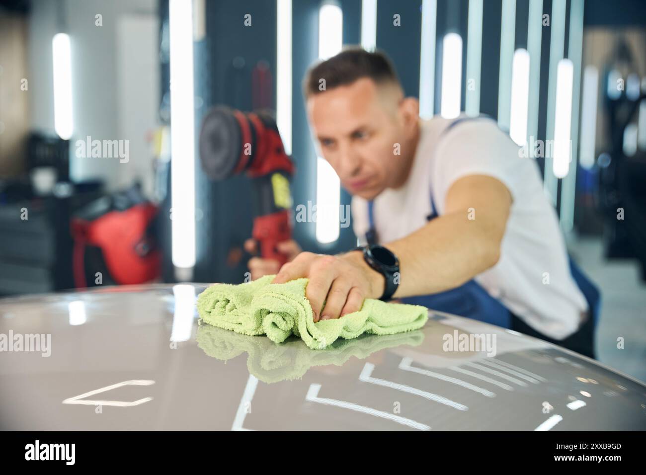 Male employee uses machine hi-res stock photography and images - Alamy