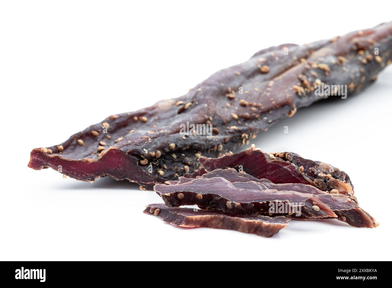 Delicacy dry smoked beef meat isolated on white Stock Photo - Alamy