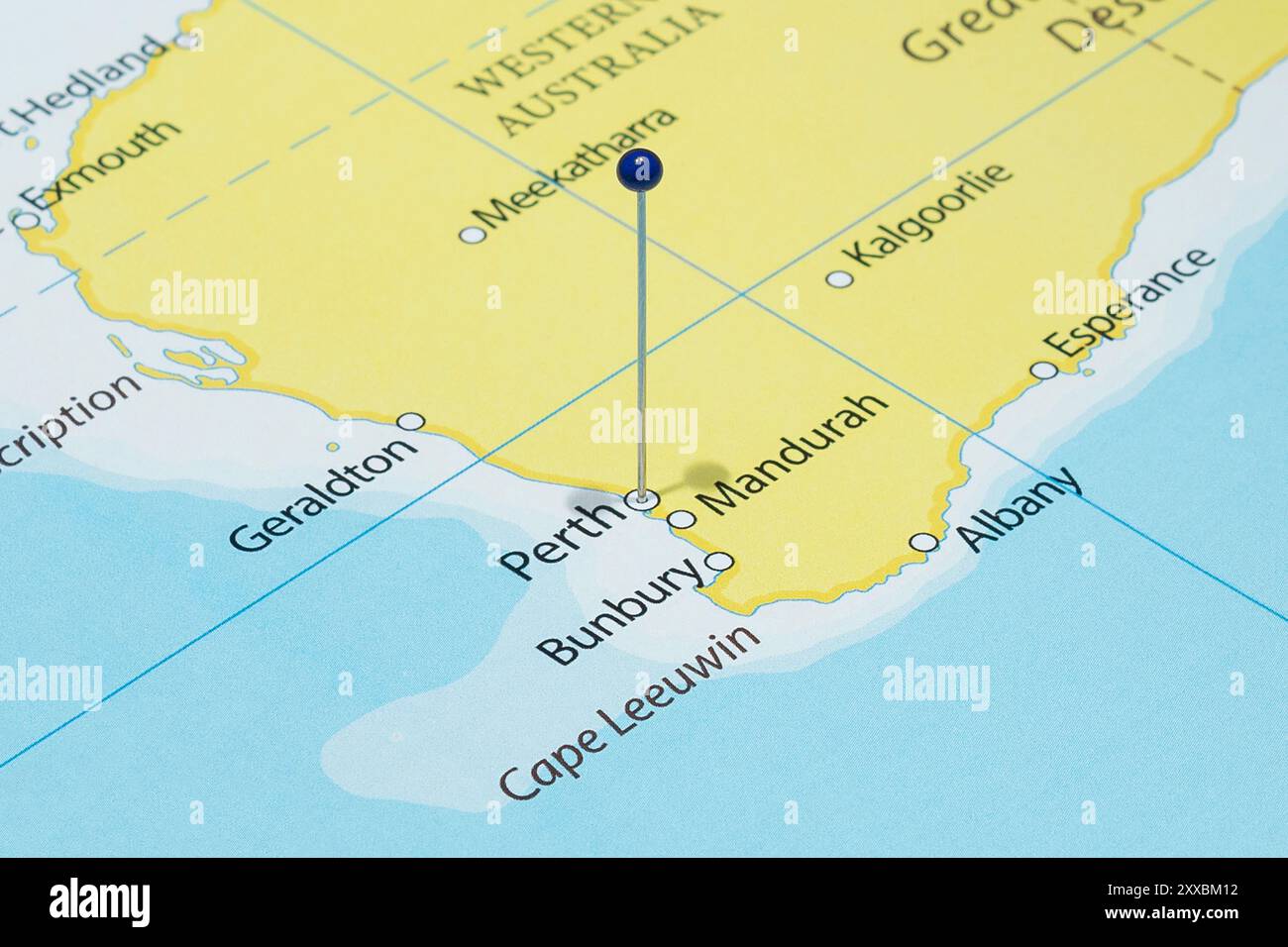 Close up to a Perth city with a blue pin needle into Australia country ...