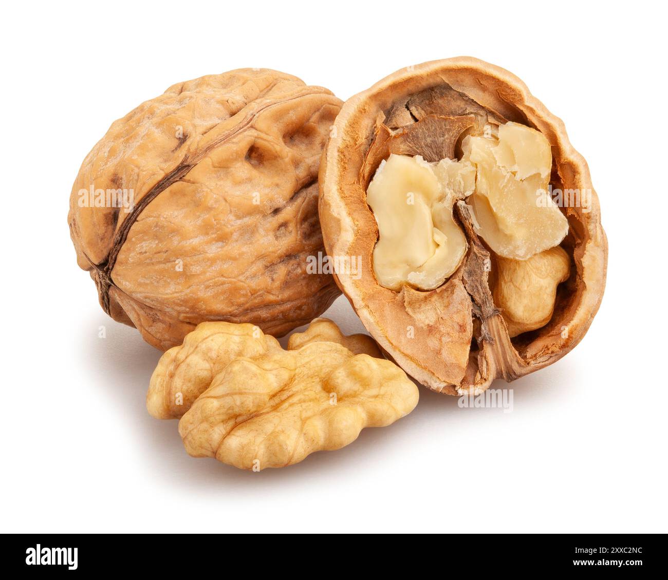 sliced walnuts path isolated on white Stock Photo