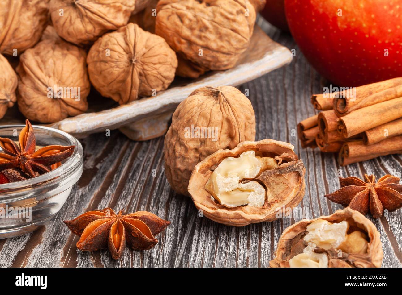 sliced walnuts group on wood background Stock Photo