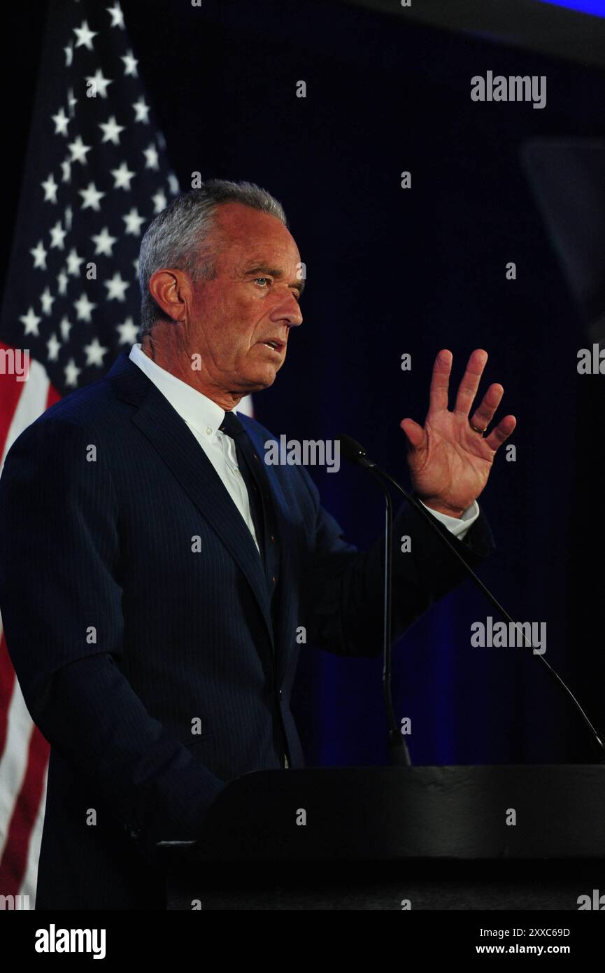 Phoenix, USA. 23rd Aug, 2024. Independent Presidential candidate Robert F. Kennedy Jr. announces his withdrawal from the presidential race and his endorsement of former President Donald Trump during a press conference in Phoenix, Arizona, on August 23rd, 2024. This decision follows difficulties in appearing on election ballots for the 2024 United States presidential election. Credit: Eduardo Barraza/Alamy Live News Stock Photo