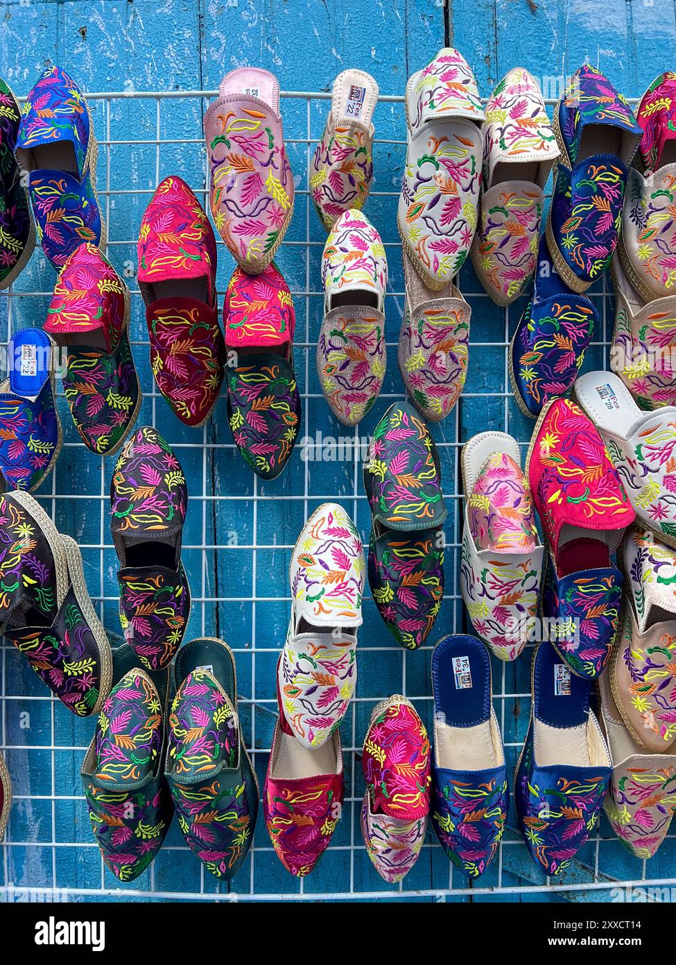Traditional Moroccan shoes for sale in Chefchaouen, Morocco Stock Photo