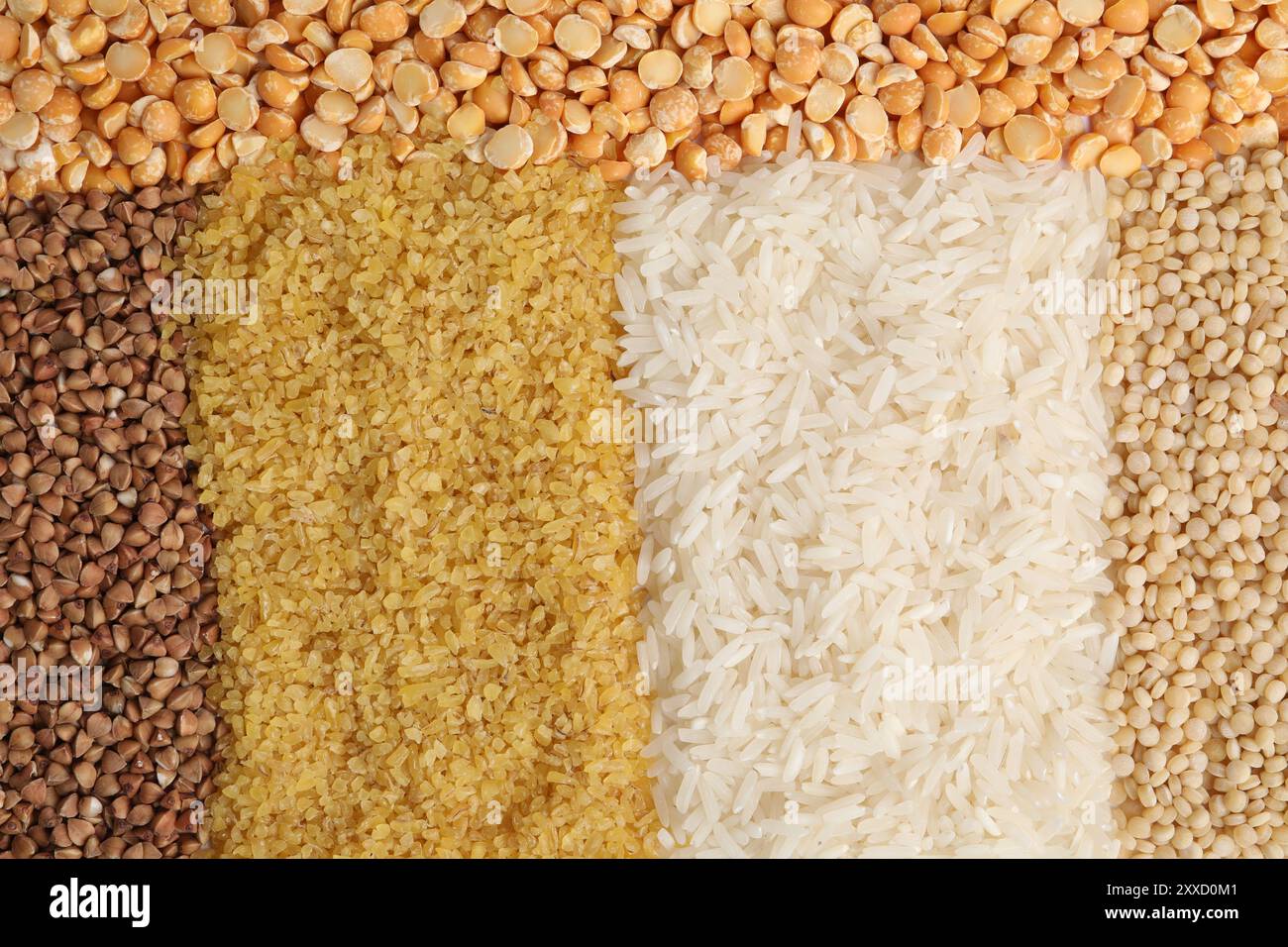 Different types of cereals and peas as background, top view Stock Photo ...