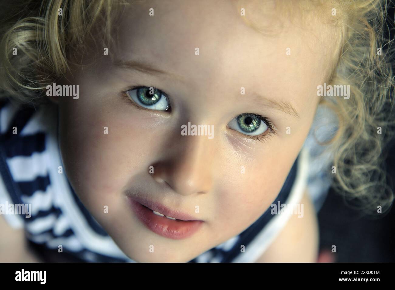Portrait of a little girl with blonde hair Stock Photo - Alamy