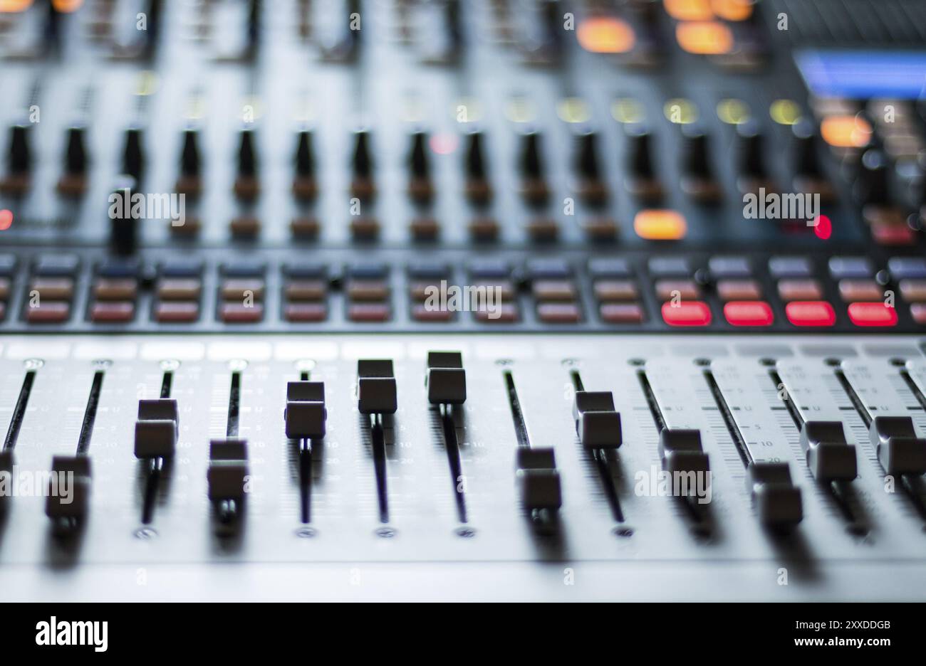 Professional music production in a sound recording studio, mixer desk ...