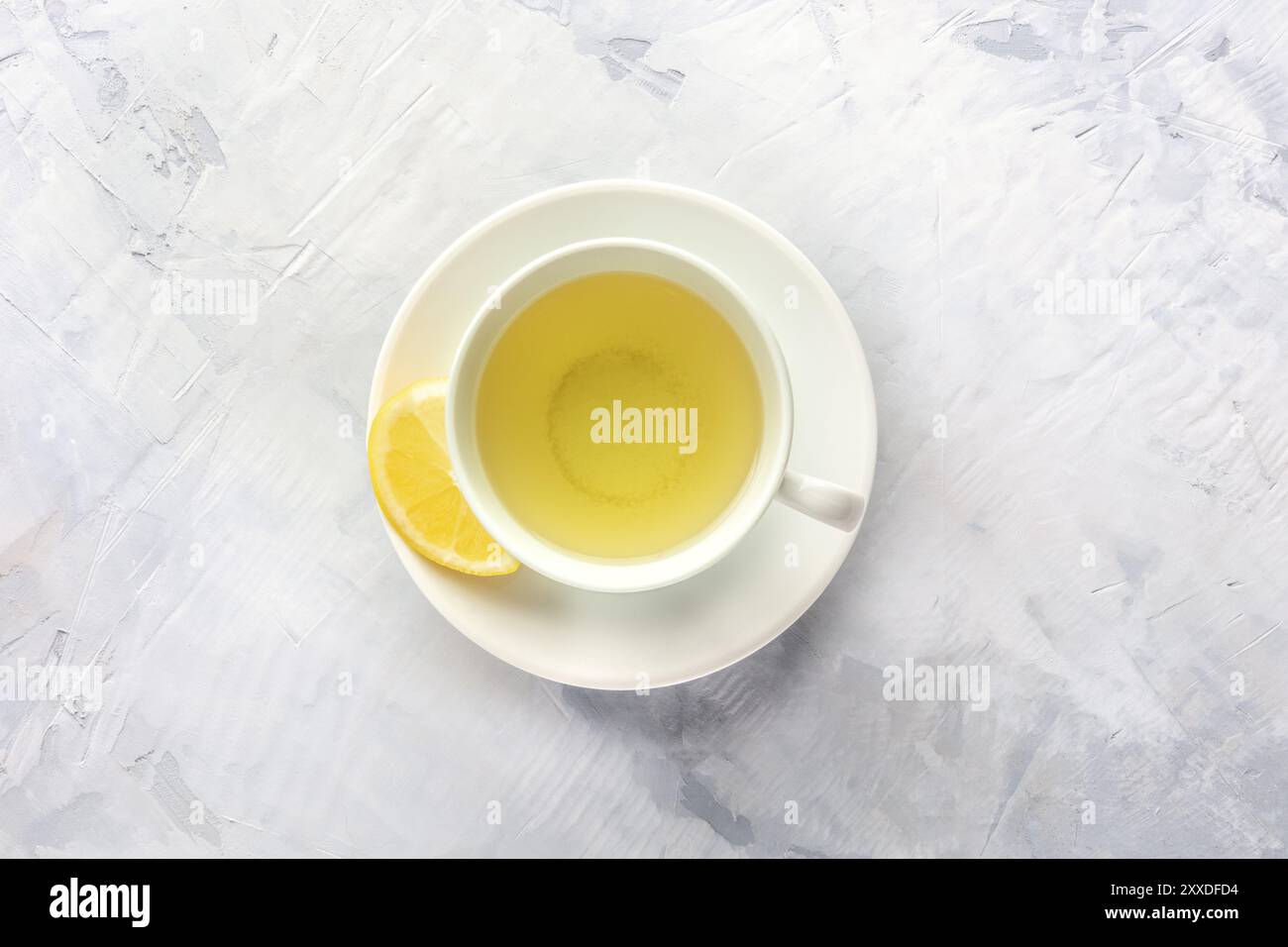 A photo of a cup of tea with lemon, shot from the top with copy space Stock Photo