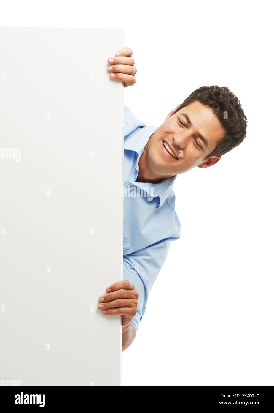 Peek, happy man and poster sign for advertising, mockup or space isolated on white studio background. Person, peep and banner board for promo, news or Stock Photo